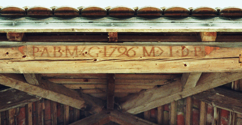 Poutre attestant la construction de l'ancien four à pain en 1796.